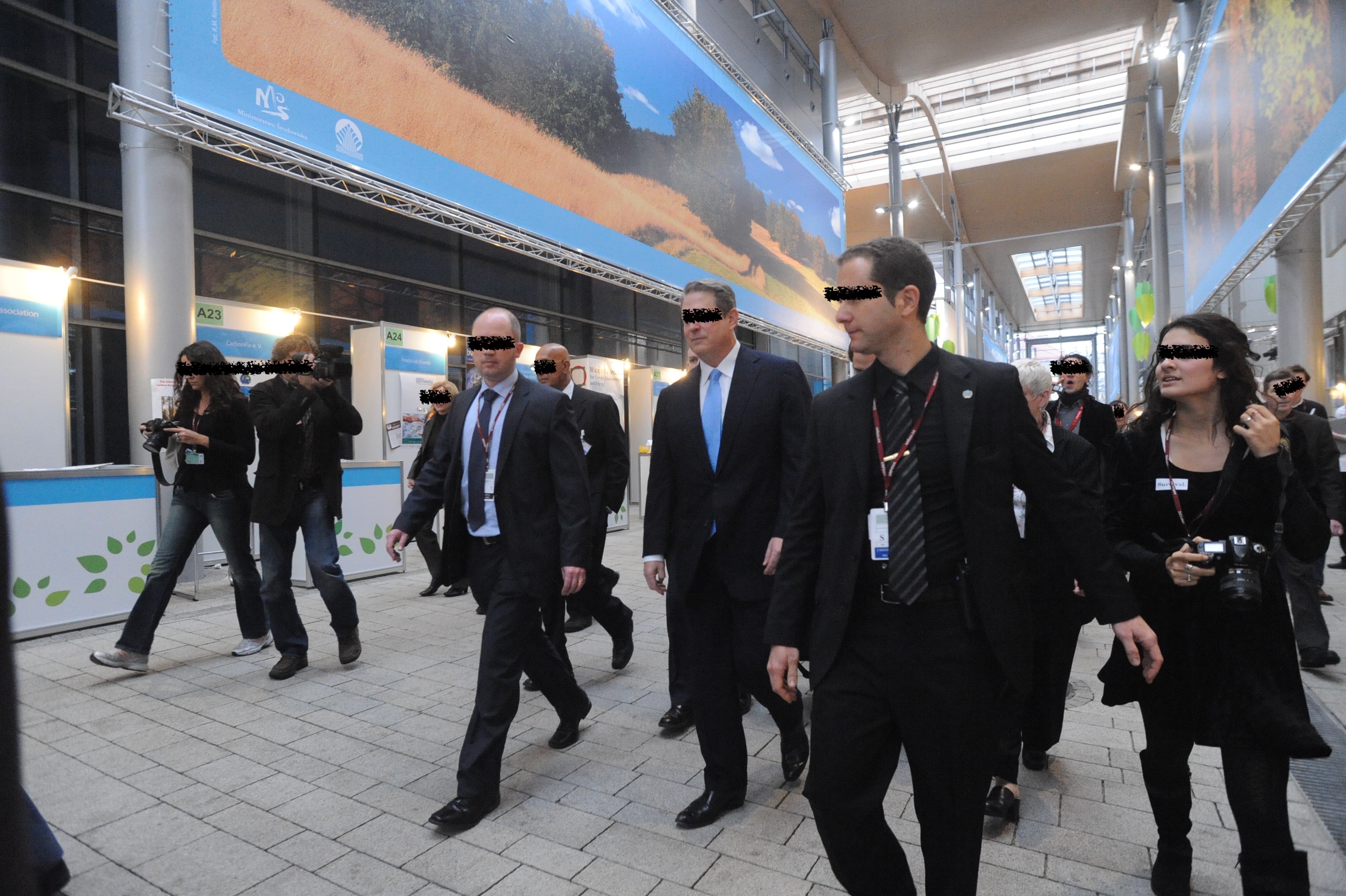 Close protection formation during an international assignment, faces obscured for discretion
